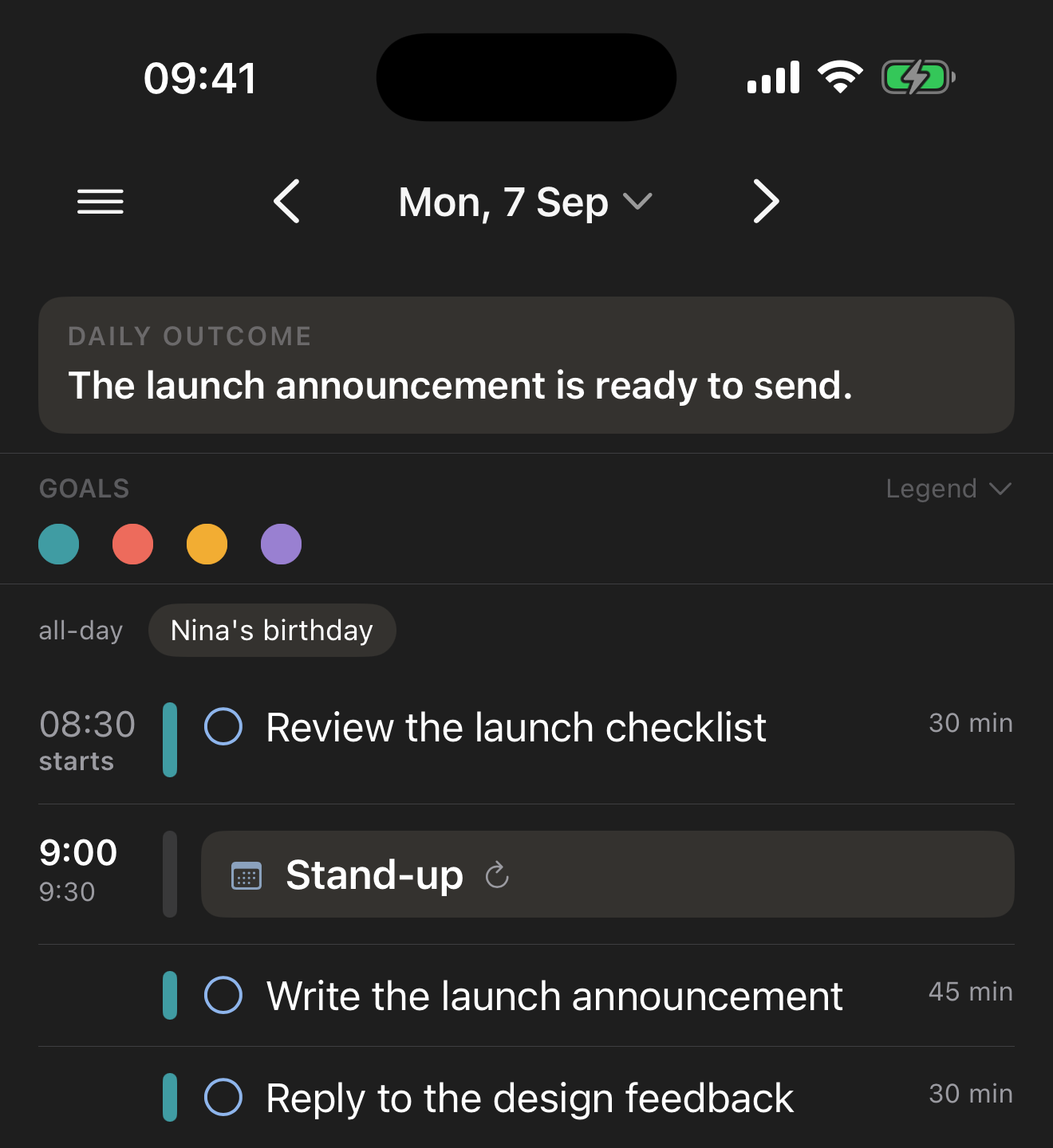 Make My Day on iPhone: the day's outcome written at the top, four goals in their colours, and the morning on one timeline — a stand-up followed by two tasks carrying the colour of the goal they serve.