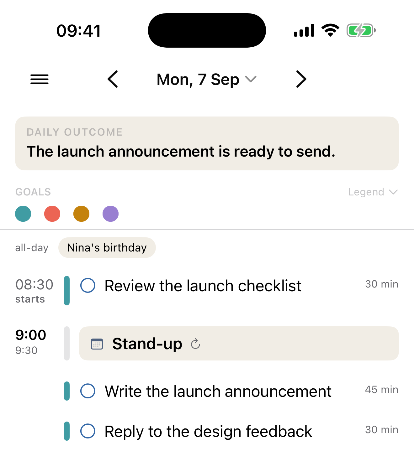 Make My Day on iPhone: the day's outcome written at the top, four goals in their colours, and the morning on one timeline — a stand-up followed by two tasks carrying the colour of the goal they serve.